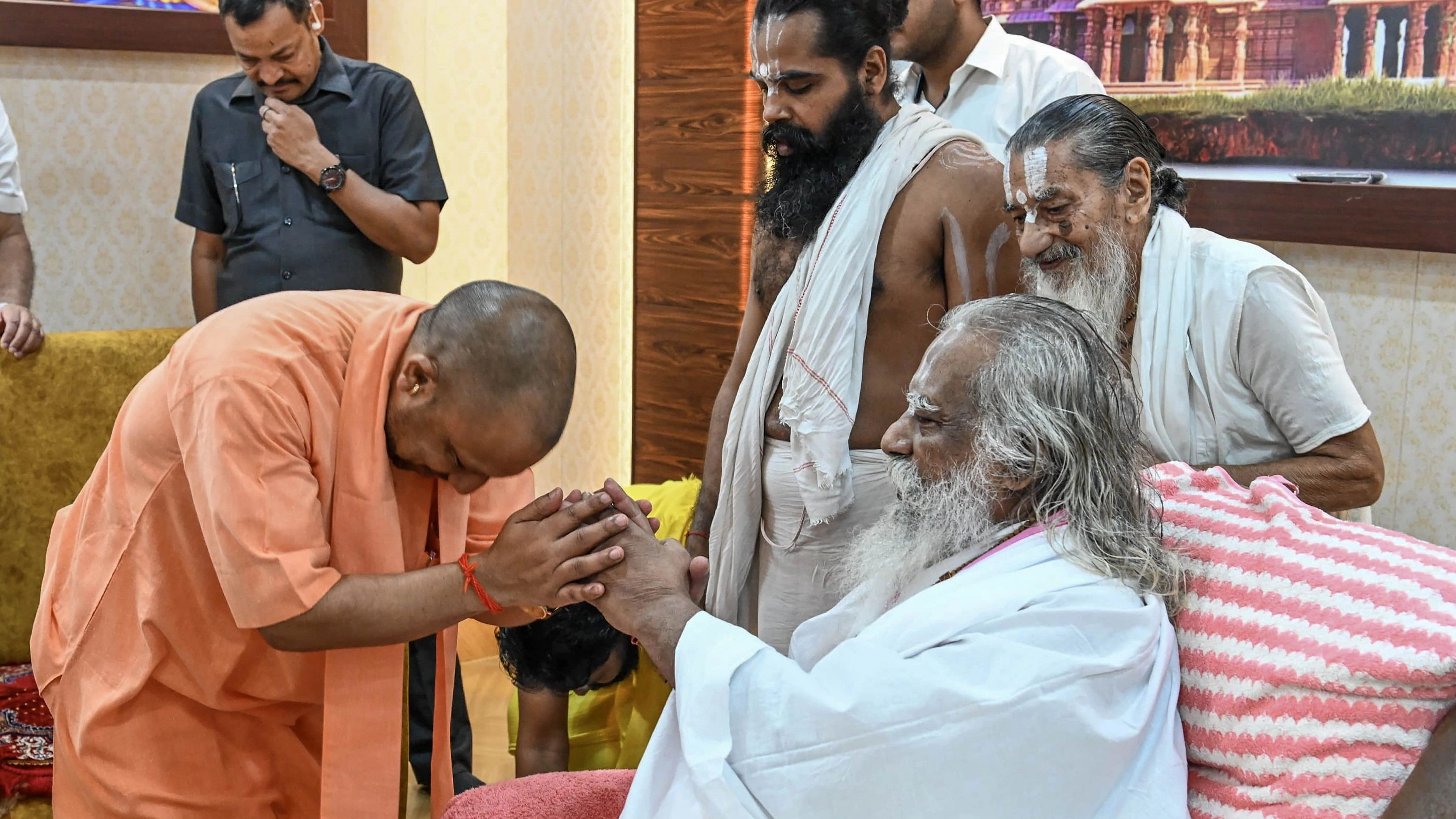 <div class="paragraphs"><p>File Photo: Uttar Pradesh Chief Minister Yogi Adityanath meets Shri Ram Janmabhoomi Tirath Kshetra Trust Chairman Mahant Nritya Gopal Das, in Ayodhya.</p></div>