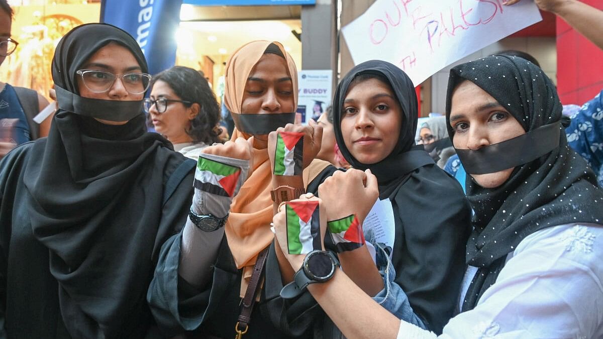 <div class="paragraphs"><p>Supporters of Palestine are held a protest against Israel and condemn war on Palestine at MG Road in Bengaluru on Monday, 16th October 2023.</p></div>