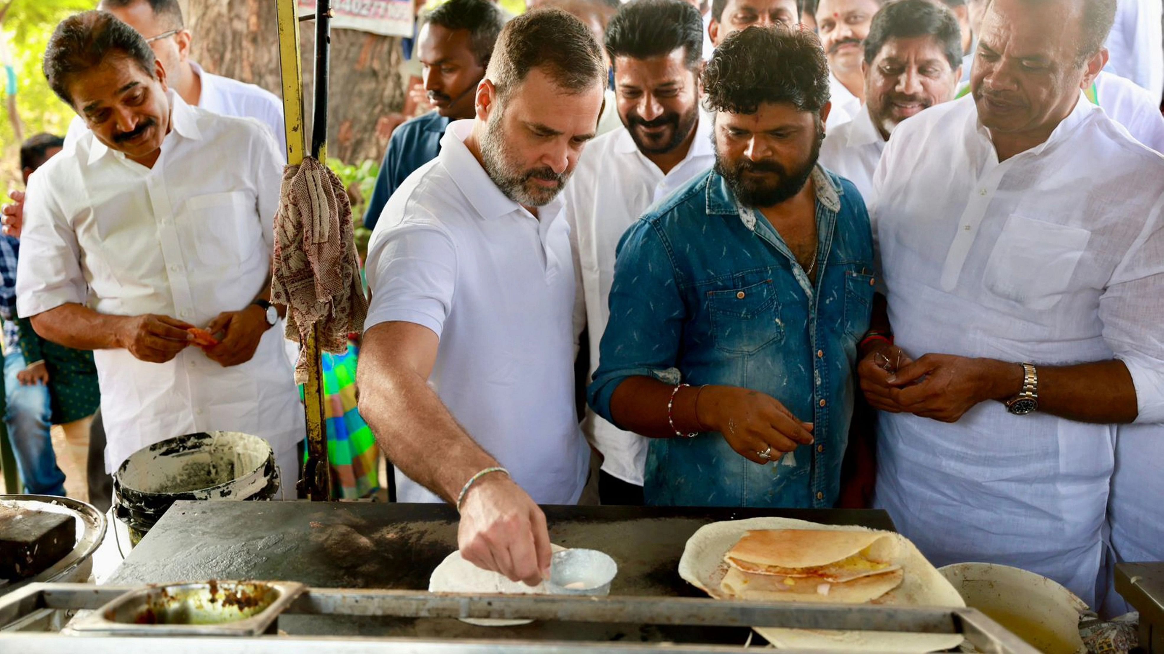 <div class="paragraphs"><p>Congress leader Rahul Gandhi makes 'dosa' at a food stall during his visit to Telangana ahead of the State Assembly elections, in Jagtial district, Friday, Oct. 20, 2023.</p></div>