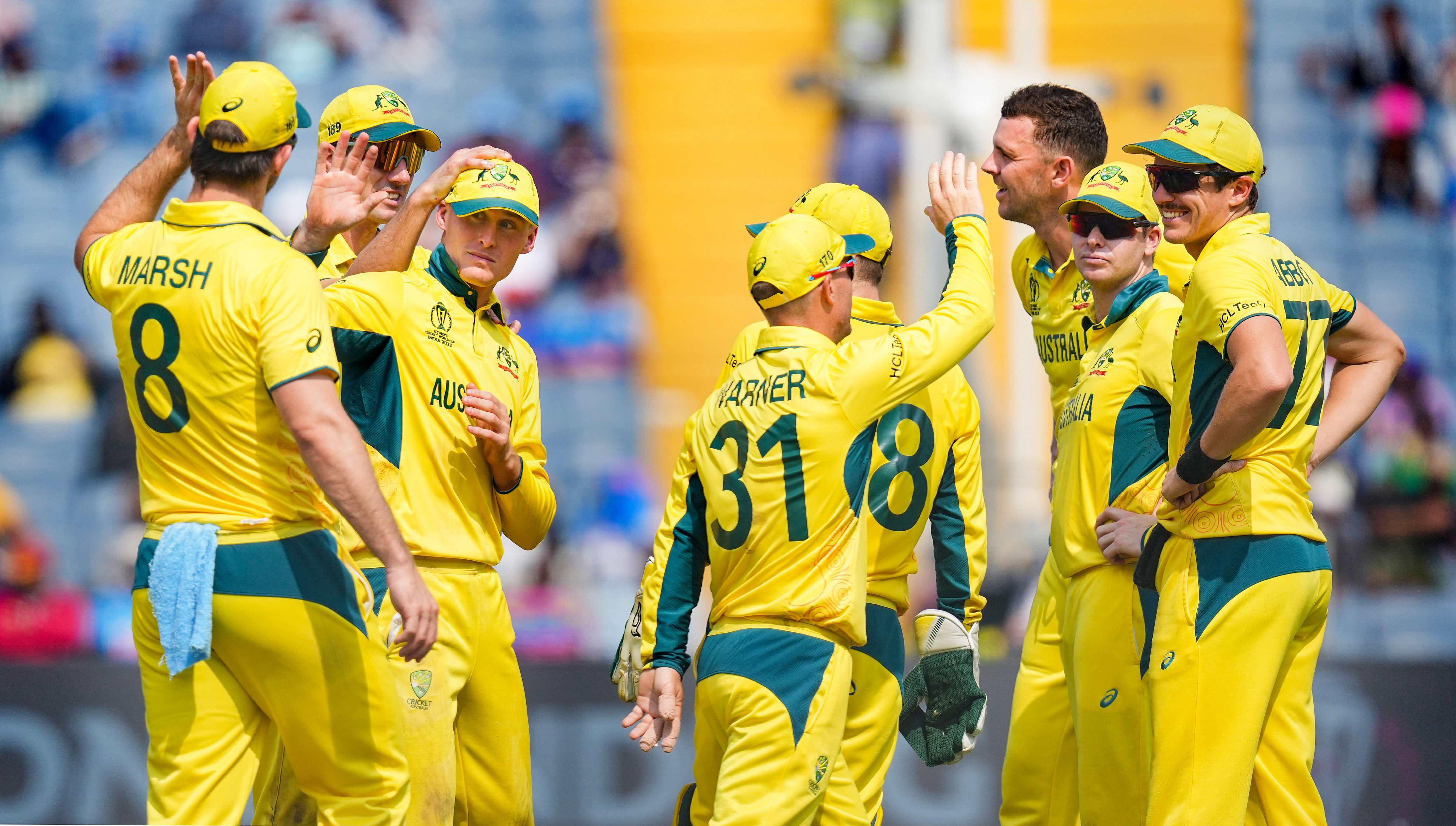 <div class="paragraphs"><p>Pune: Australia's Marnus Labuschagne celebrates with teammates after taking the wicket of Bangladesh's Mahmudullah through run out during the ICC Men's Cricket World Cup 2023 match between Australia and Bangladesh, at Maharashtra Cricket Association Stadium, in Pune, Saturday, Nov. 11, 2023. </p></div>