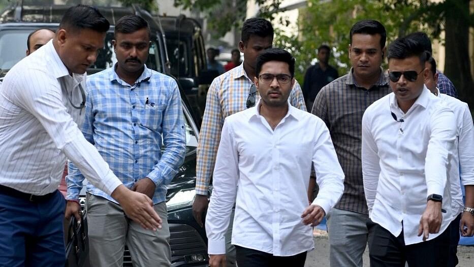 <div class="paragraphs"><p>TMC MP Abhishek Banerjee leaves from the Enforcement Directorate (ED) office after questioning in connection with alleged teachers recruitment scam, in Kolkata.&nbsp;</p></div>