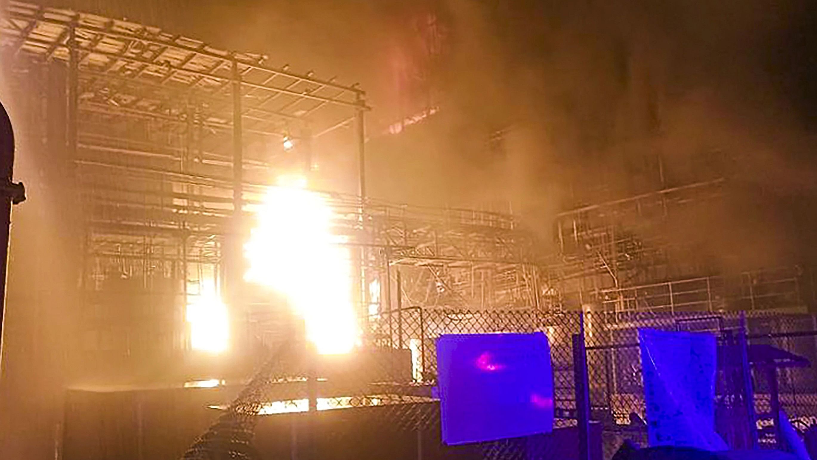 <div class="paragraphs"><p> Flame billows out after a fire broke out at a chemical plant following an explosion in a storage tank, injuring 24 workers, in Gujarat's Surat, Wednesday, Nov. 29, 2023.  </p></div>