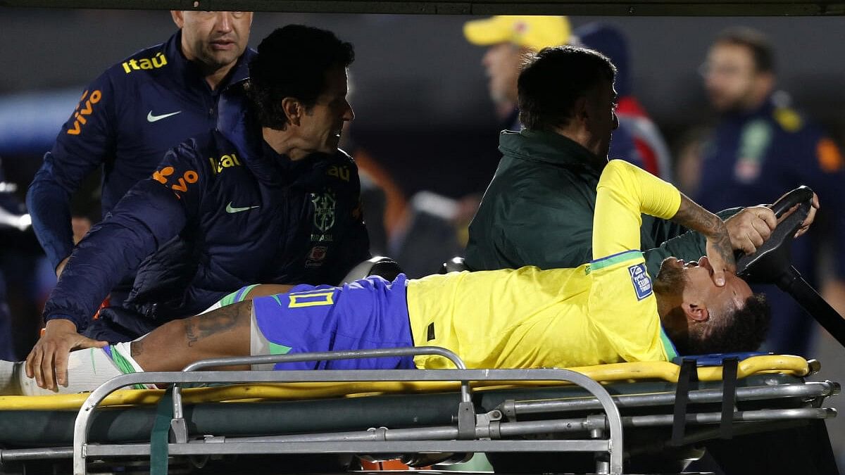 <div class="paragraphs"><p>Neymar is brought off the pitch after sustaining an injury during the Uruguay vs Brazil match.</p></div>