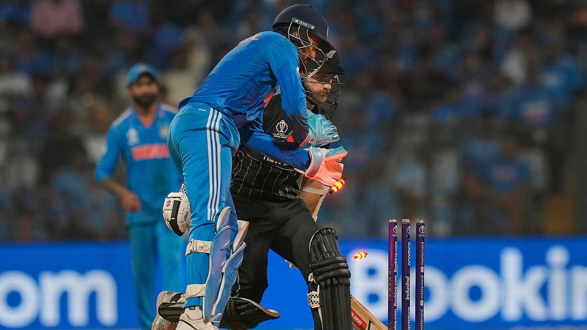 <div class="paragraphs"><p>India's KL Rahul attempts to run out New Zealand's captain Kane Williamson during the ICC Men's Cricket World Cup 2023 first semi-final match between India and New Zealand, at the Wankhede Stadium, in Mumbai, Wednesday, Nov. 15, 2023.</p></div>