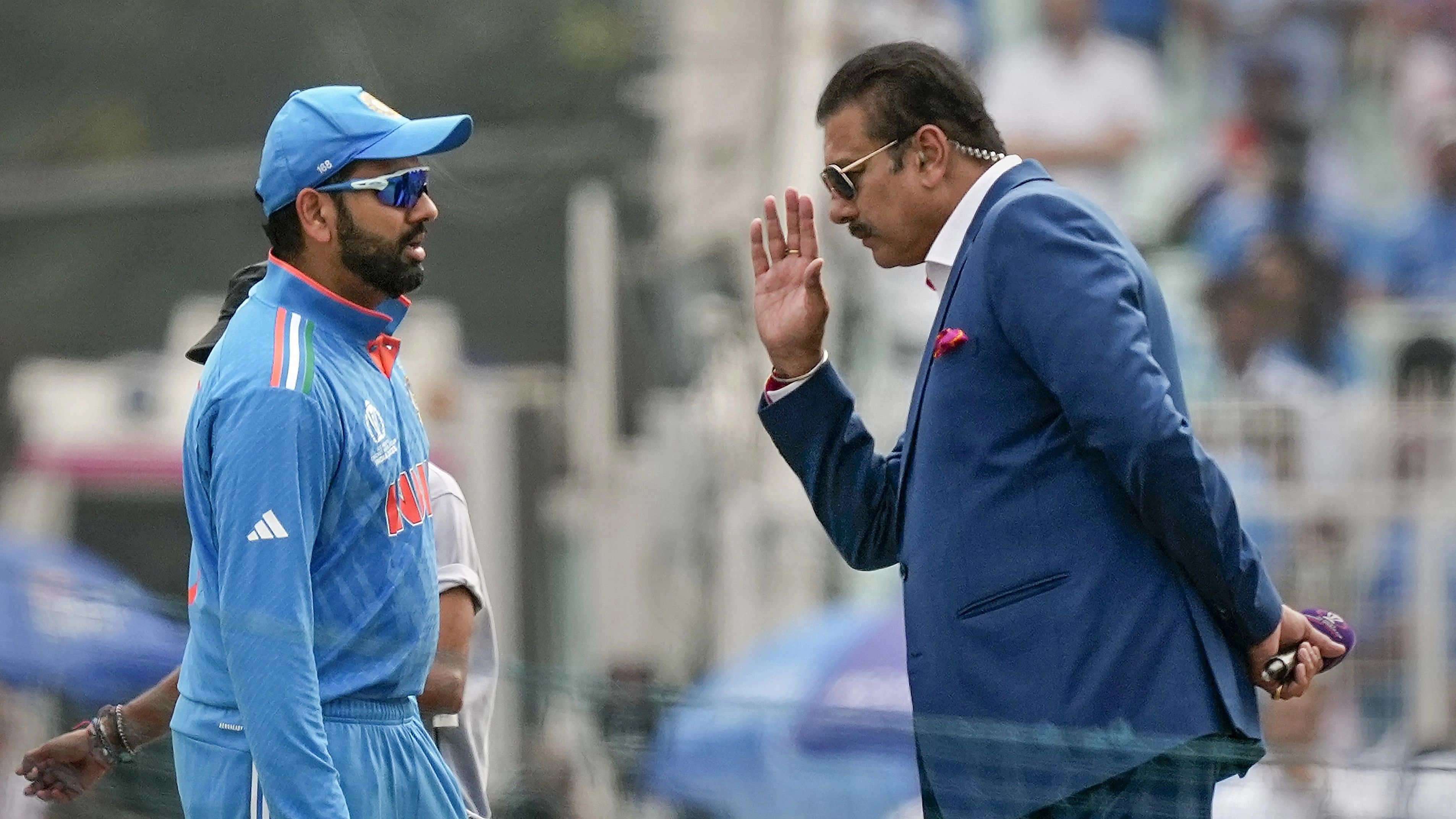 <div class="paragraphs"><p>Rohit Sharma and Ravi Shastri.</p></div>