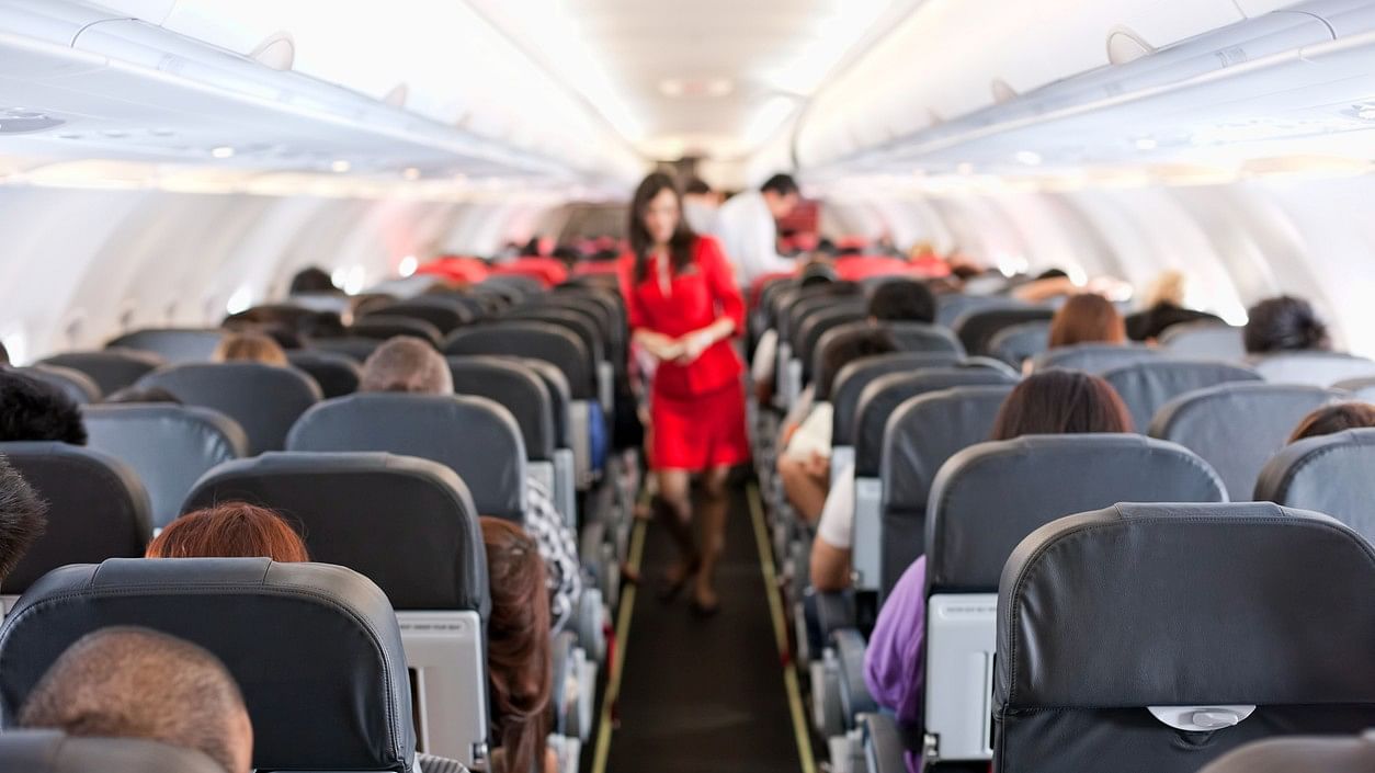 <div class="paragraphs"><p>Representative image showing cabin crew working in a flight.</p></div>