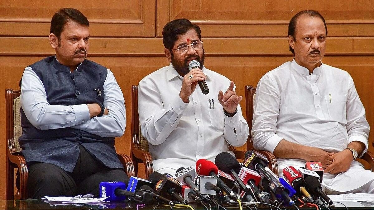 <div class="paragraphs"><p>Maharashtra CM  Eknath Shinde with Deputy CMs Devendra Fadnavis and Ajit Pawar during a press conference after a meeting on the issue of 'Maratha' reservation.&nbsp;</p></div>