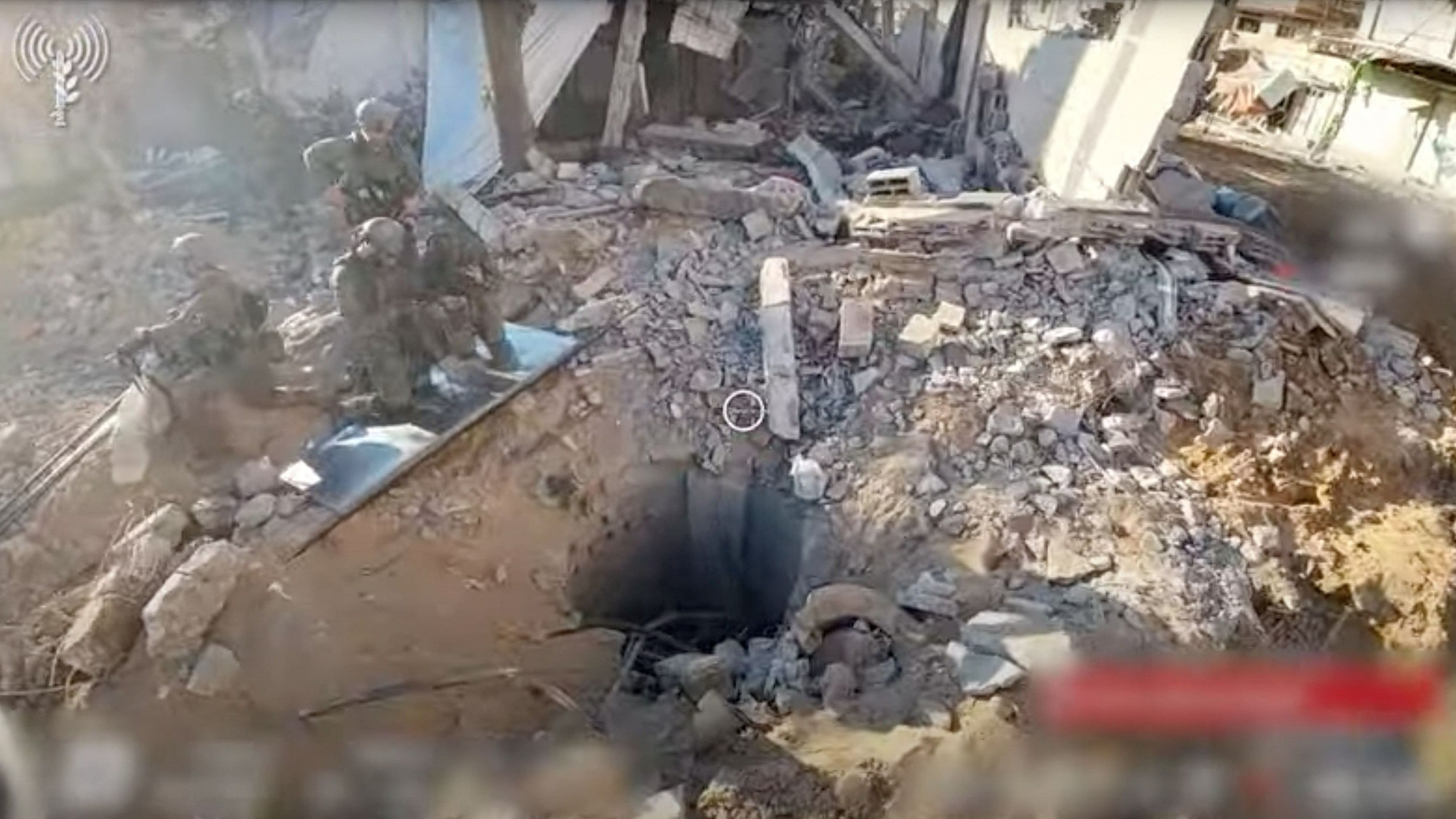 <div class="paragraphs"><p>An opening to a tunnel that, according to Israel's military, was used by Palestinian militants under Al Shifa hospital in the Gaza Strip as seen in this screen grab taken from a handout video released by the Israel Defense Forces on November 19, 2023, amid the ongoing conflict between Israel and the Palestinian Islamist group Hamas. </p></div>