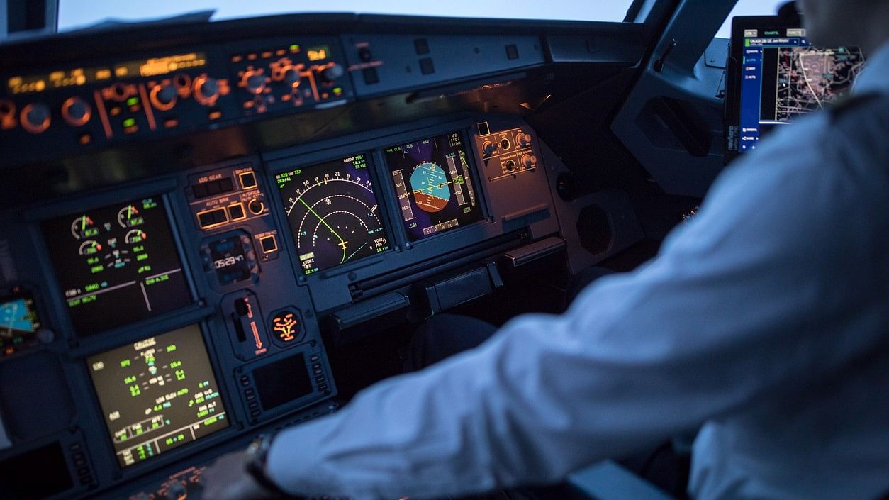 <div class="paragraphs"><p>Representative image showing a pilot in a cockpit.</p></div>