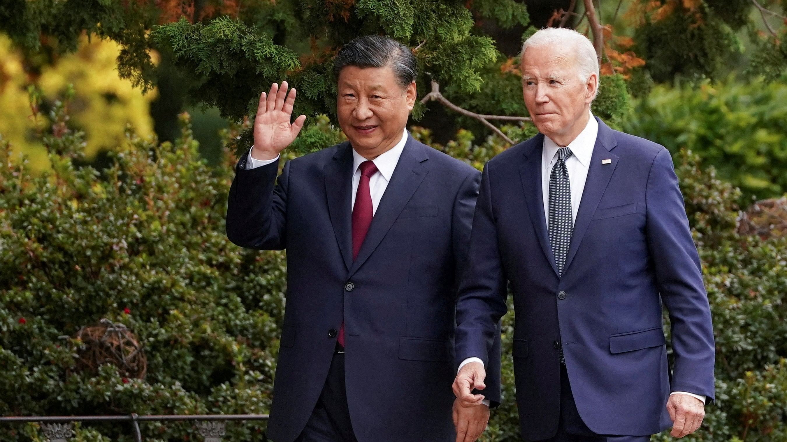 <div class="paragraphs"><p>Chinese President Xi Jinping waves as he walks with U.S. President Joe Biden at Filoli estate on the sidelines of the Asia-Pacific Economic Cooperation  summit, in Woodside, California, U.S., November 15, 2023.</p></div>