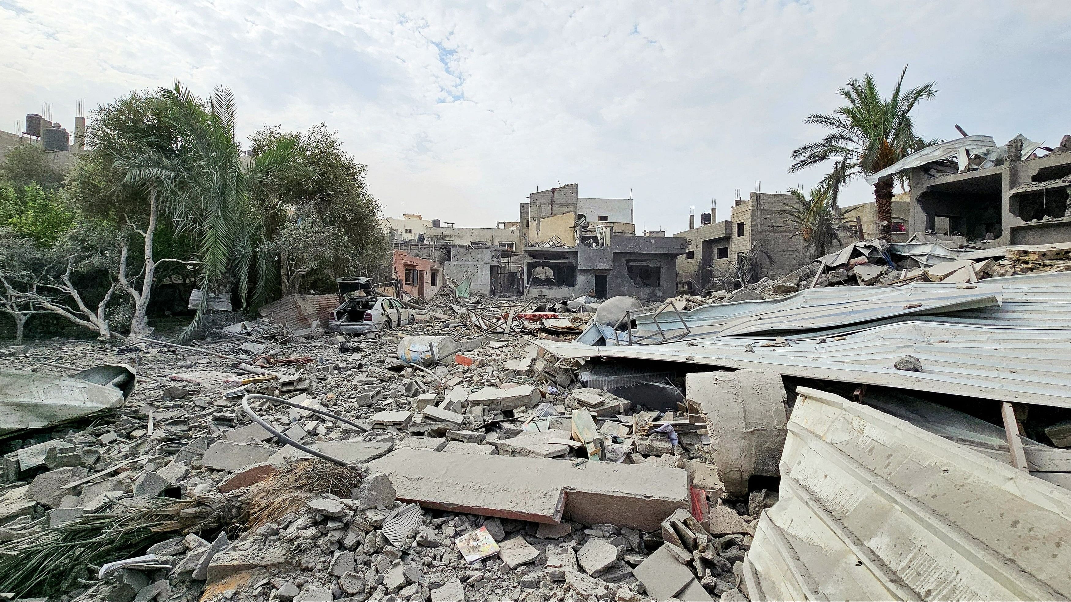 <div class="paragraphs"><p>A view of the site where Palestinian houses were destroyed by Israeli strikes, as the conflict between Israel and Palestinian Islamist group Hamas continues, in the northern Gaza Strip October 27, 2023. </p></div>