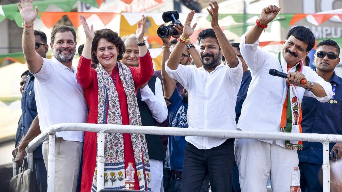 <div class="paragraphs"><p>Congress leader Rahul Gandhi with party's general secretary Priyanka Gandhi, state chief Revanth Reddy, Rajasthan CM Ashok Gehlot and other leaders during a roadshow ahead of the Telangana Assembly elections.</p></div>