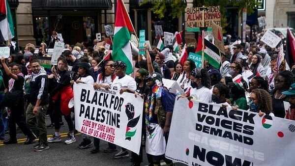 <div class="paragraphs"><p>Demonstrators march in support of Palestinians in Gaza, amid the ongoing conflict between Israel and Hamas, in Washington, U.S., November 4, 2023. </p></div>
