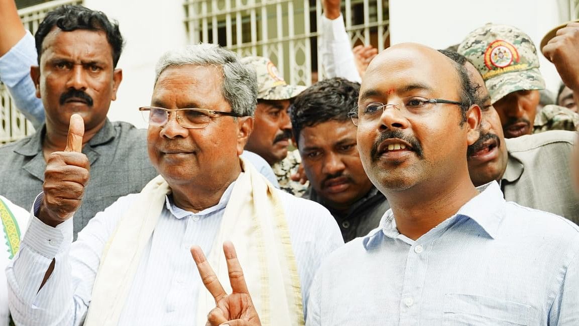 <div class="paragraphs"><p>Karnataka Chief Minister Siddaramaiah and his son Yathindra.</p></div>