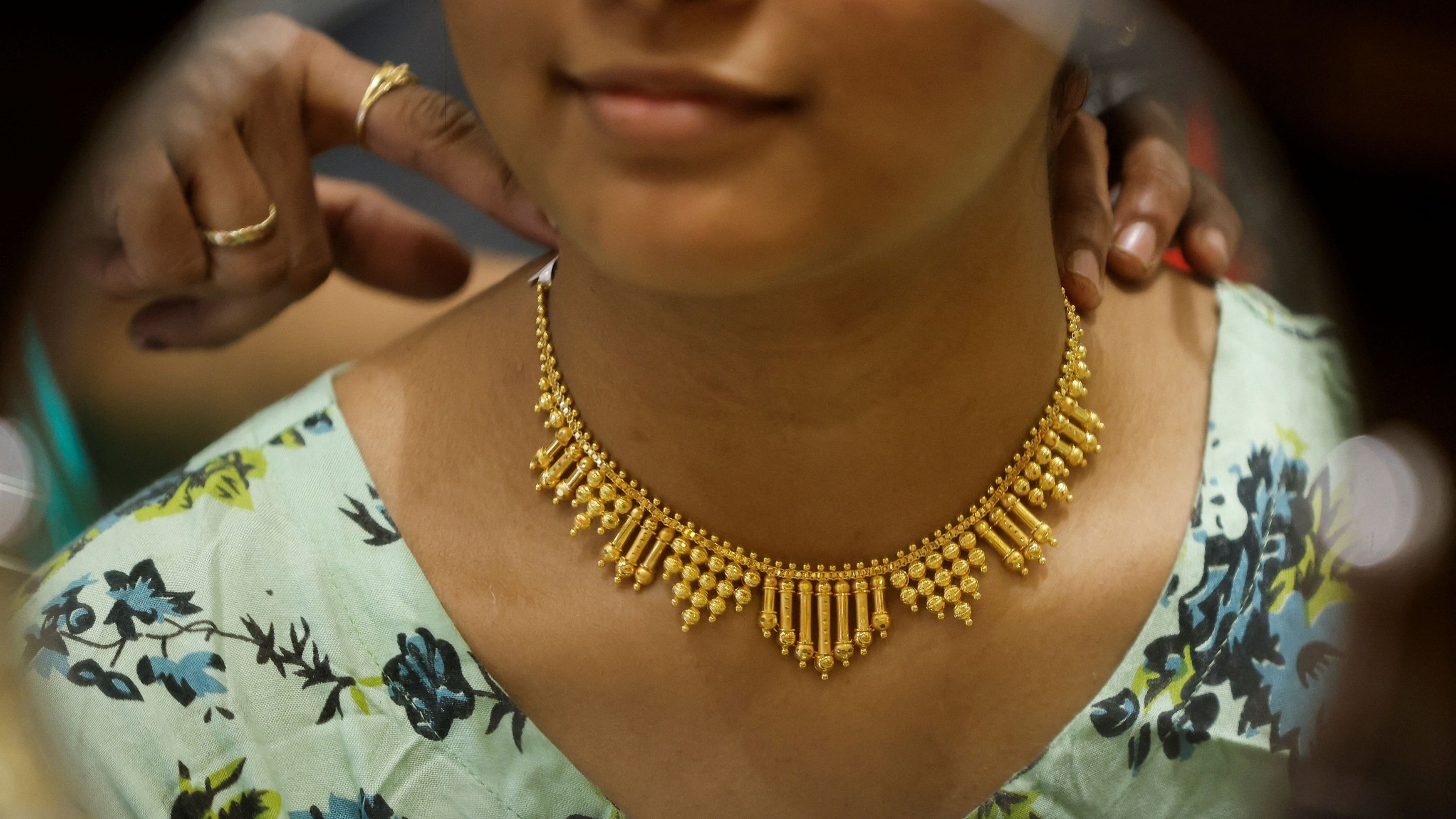 <div class="paragraphs"><p>Representative image of woman with gold jewellery.</p></div>