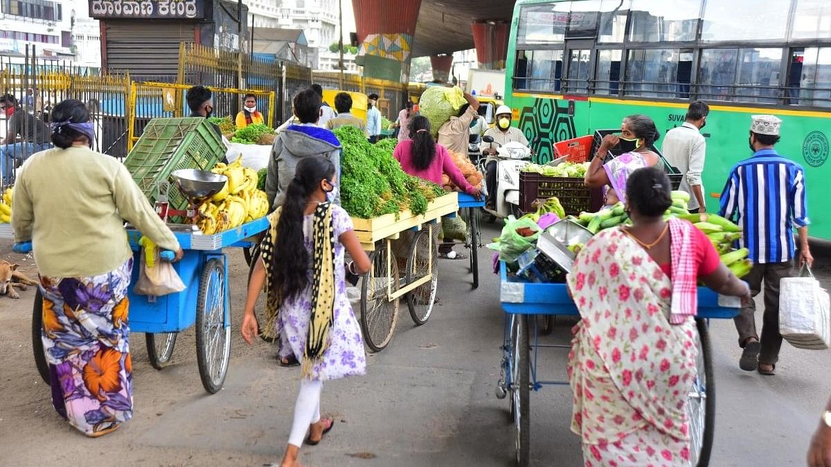 <div class="paragraphs"><p>Street vendors in Bengaluru.</p></div>