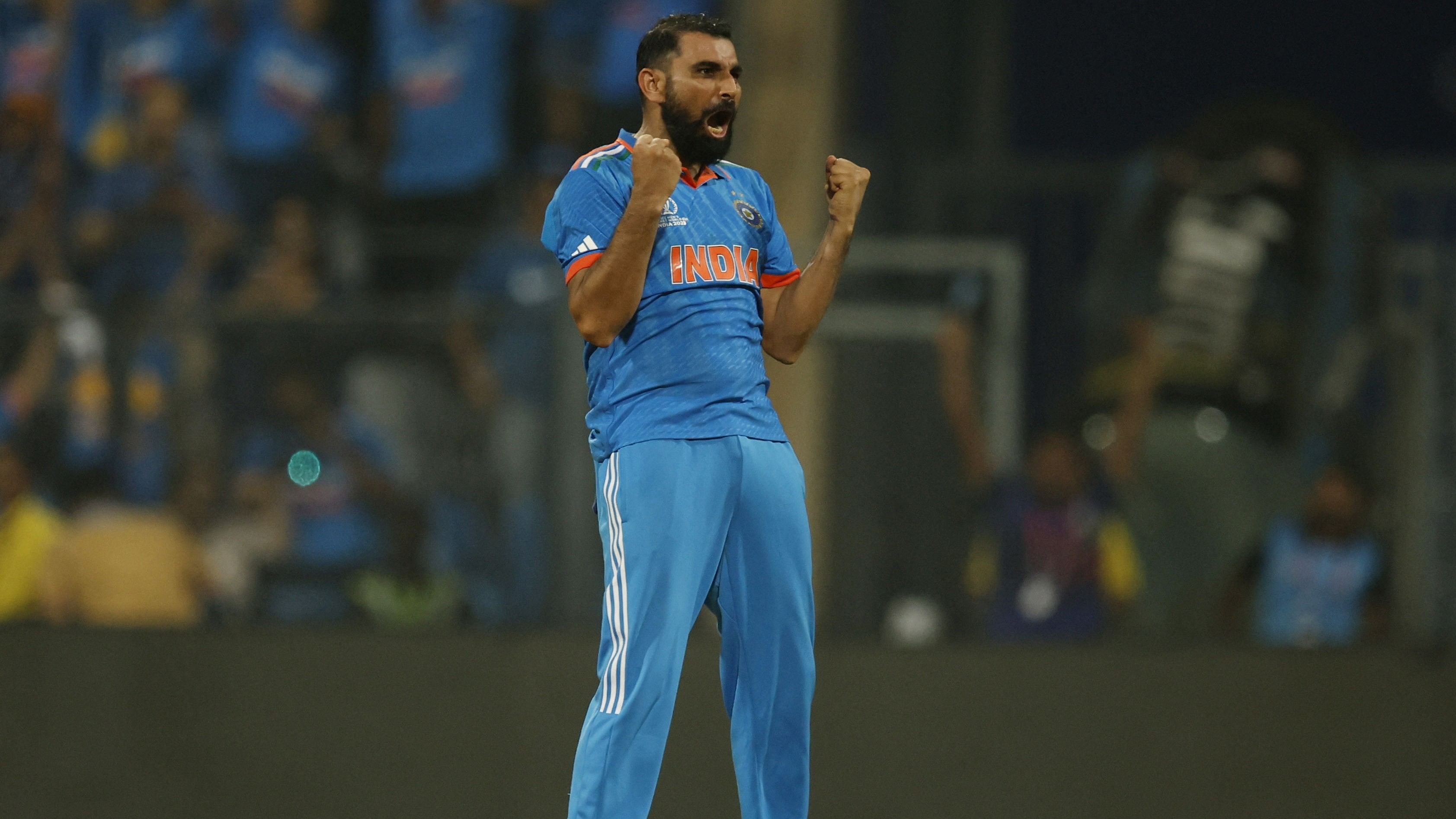 <div class="paragraphs"><p>India's Mohammed Shami celebrates his five-wicket-haul after taking the wicket of New Zealand's Daryl Mitchell, caught out by Ravindra Jadeja.&nbsp;</p></div>