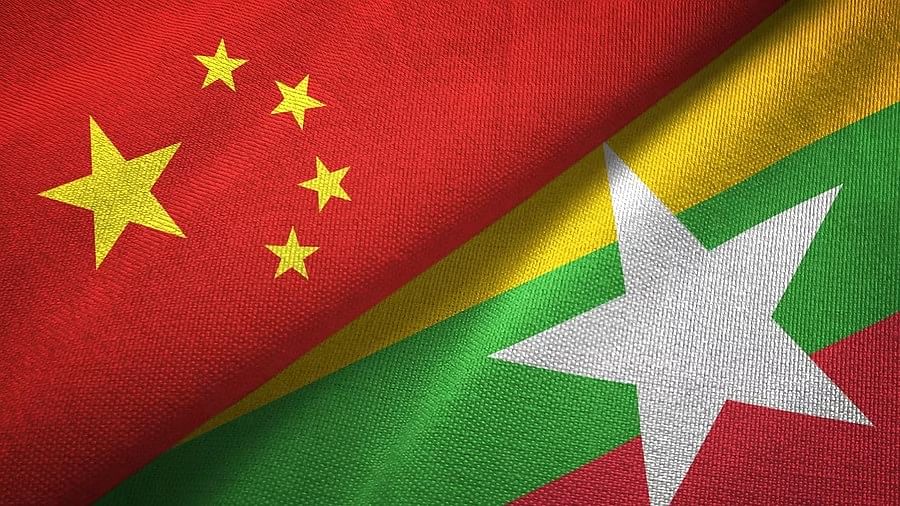 <div class="paragraphs"><p>National flags of China and Myanmar.</p></div>