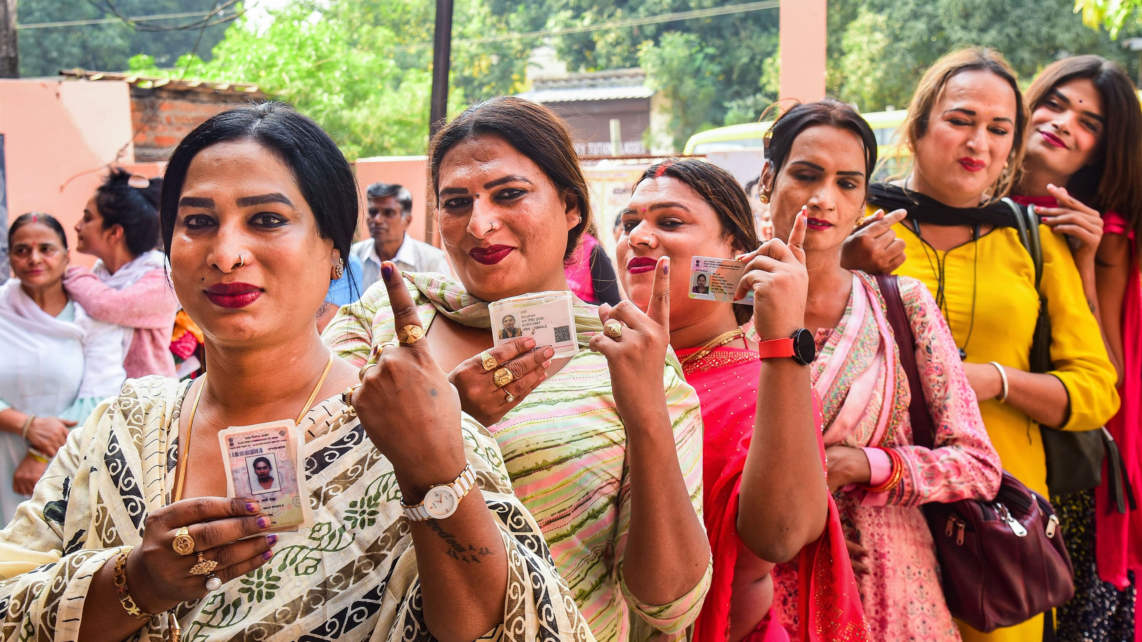 <div class="paragraphs"><p>Voters from the transgender community show their fingers marked with indelible ink after casting their votes during Madhya Pradesh Assembly elections, in Jabalpur, Friday, Nov. 17, 2023. </p></div>