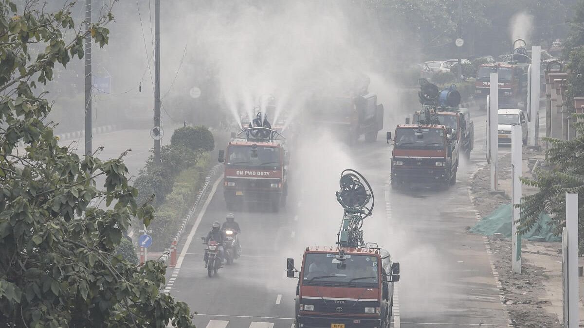 <div class="paragraphs"><p>Mobile anti-smog guns spray water to curb air pollution in Delhi.</p></div>