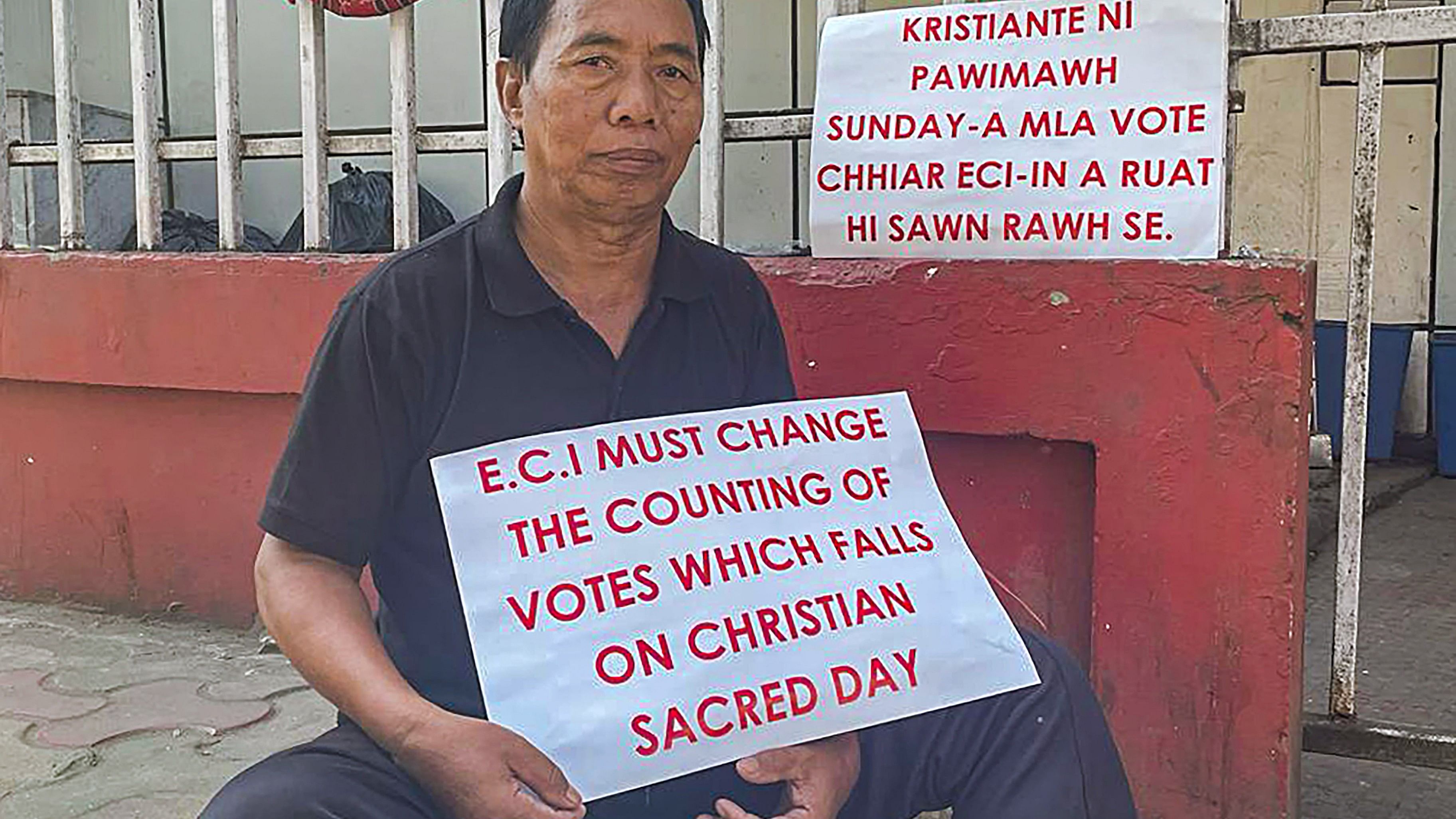 <div class="paragraphs"><p>Lalbiakthanga, a social activist known as 'walkathon man', sits on a hunger strike demanding to reschedule the day of the counting of votes on the day of voting for Mizoram Assembly elections, in Aizawl.&nbsp;</p></div>