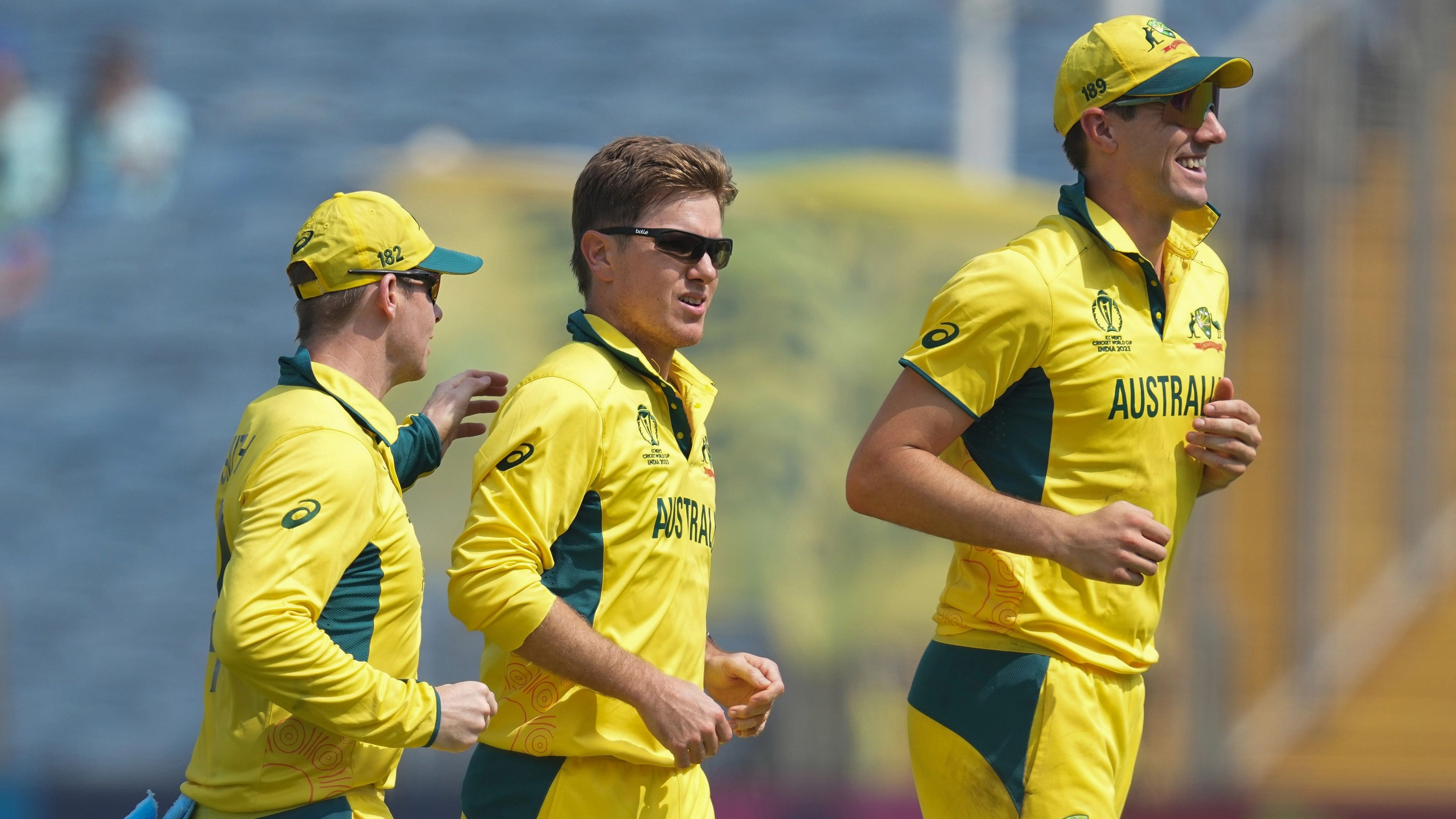 <div class="paragraphs"><p>Australia's Adam Zampa celebrates with captain Pat Cummins and Steve Smith after taking the wicket of Bangladeshs Litton Das during the ICC Men's Cricket World Cup 2023 match between Australia and Bangladesh, at Maharashtra Cricket Association Stadium, in Pune, Saturday, Nov. 11, 2023.  </p></div>