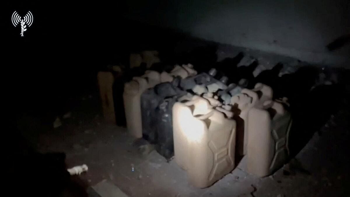 <div class="paragraphs"><p>Gallon containers are lined up on the ground, as the Israeli Army says, while delivering fuel to Al Shifa hospital, in a location given as Gaza, in this screengrab taken from a handout video released on November 12, 2023. </p></div>