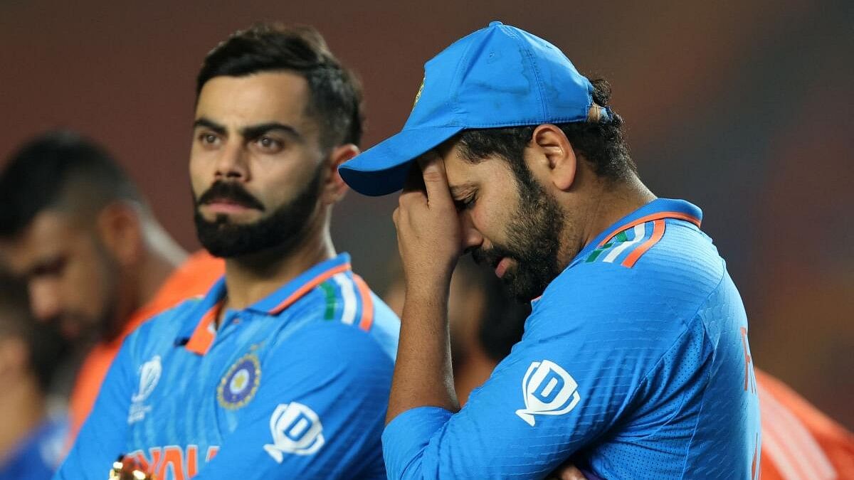 <div class="paragraphs"><p>Virat Kohli and Rohit Sharma look dejected after losing the ICC Cricket World Cup final</p></div>