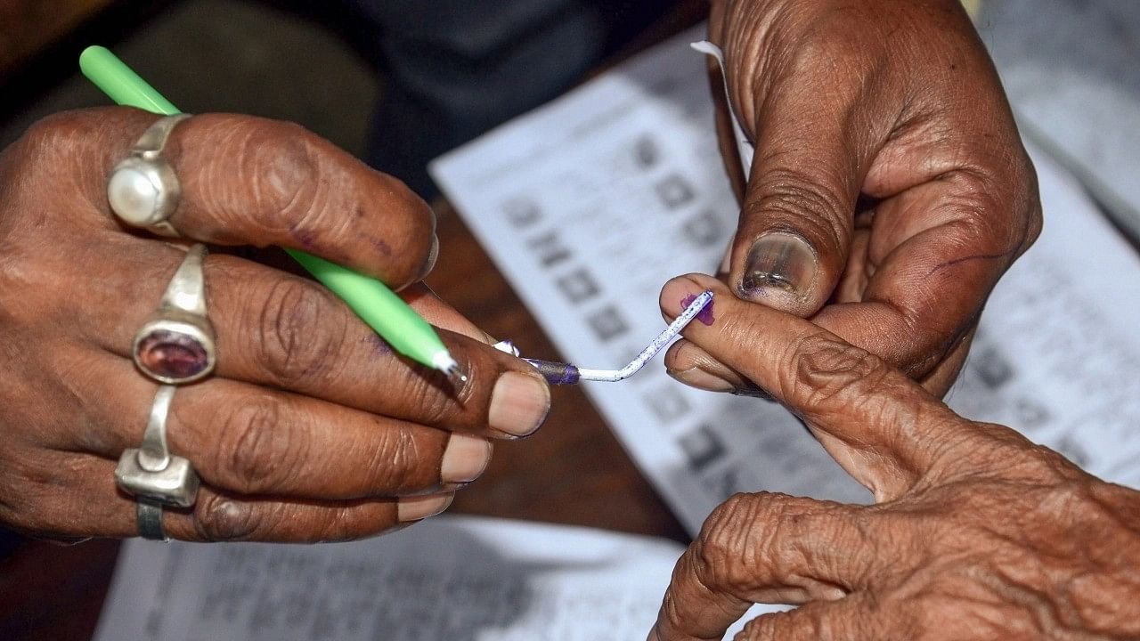 <div class="paragraphs"><p>Representative image of a person casting a vote.</p></div>