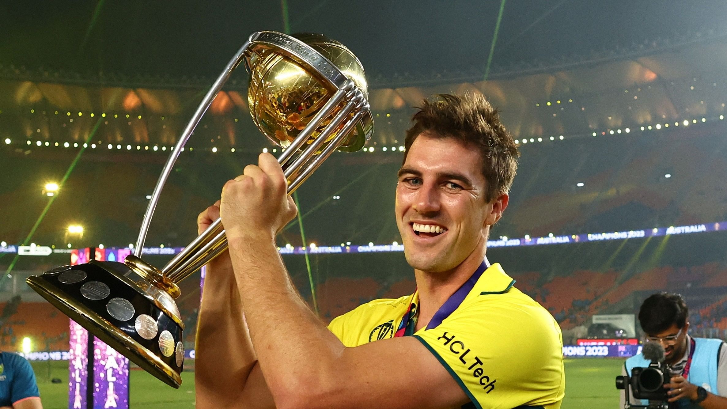 <div class="paragraphs"><p>Australia's Pat Cummins celebrates with the trophy after winning the ICC Cricket World Cup.&nbsp;</p></div>