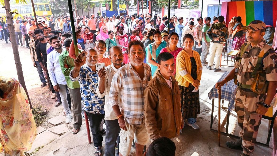 <div class="paragraphs"><p>Voters wait in queues at a polling station to cast their votes for the Madhya Pradesh Assembly elections, in Jabalpur.</p></div>