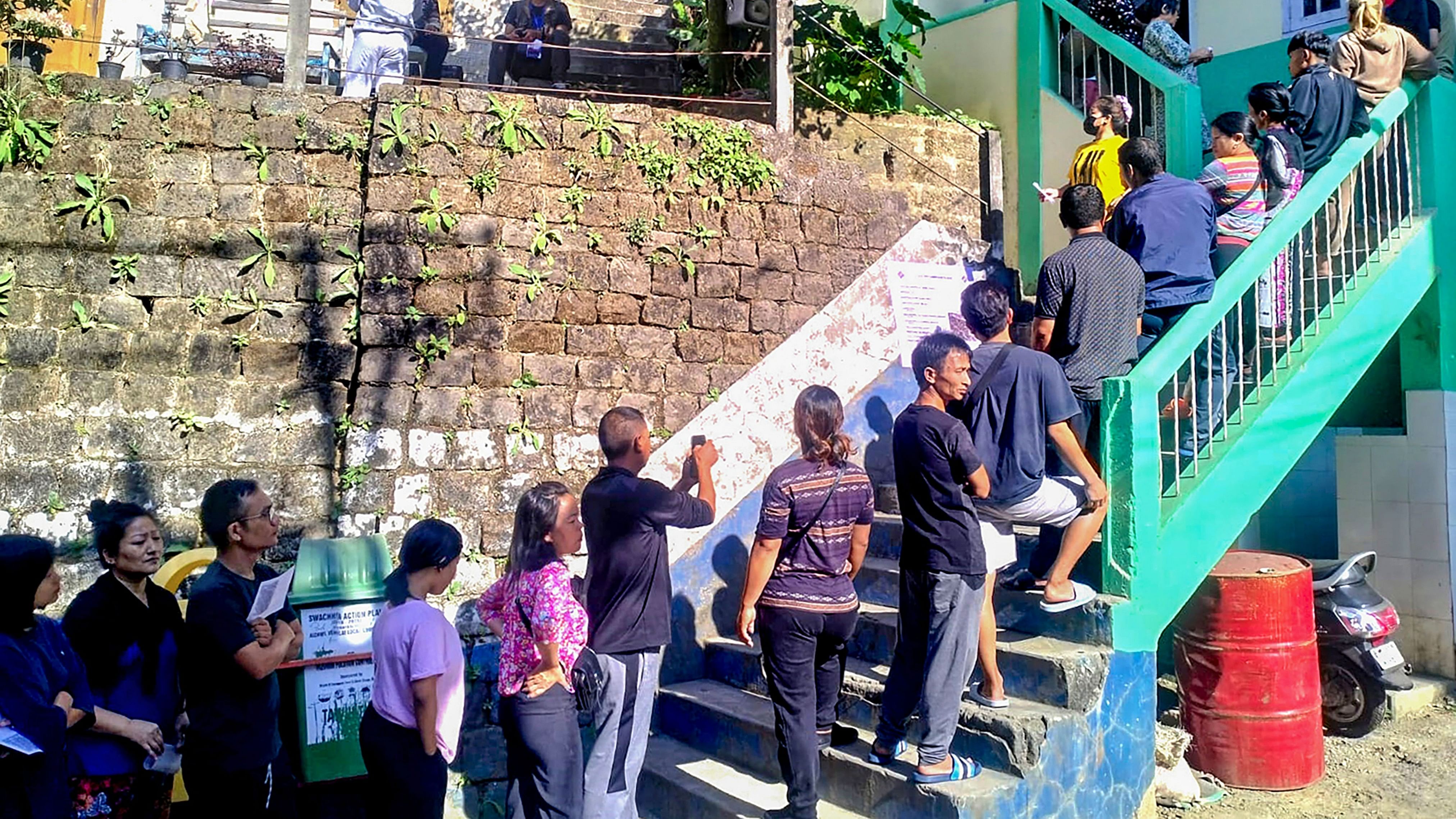 <div class="paragraphs"><p>Voters wait in a queue to cast their votes for Mizoram Assembly elections, in Aizawl, Tuesday, Nov. 7, 2023.</p></div>