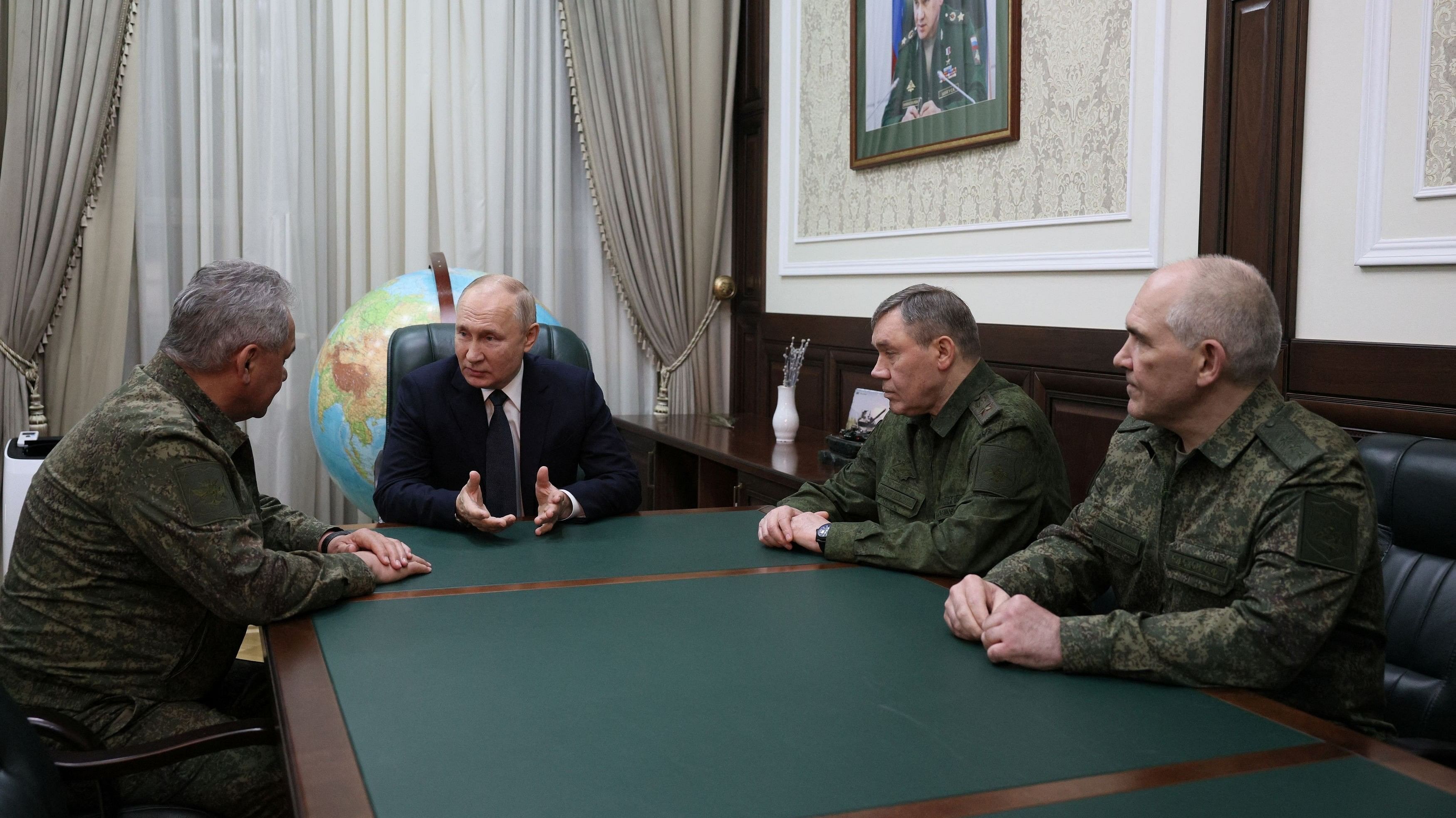 <div class="paragraphs"><p>Russia's President Vladimir Putin meets with Defence Minister Sergei Shoigu, Chief of the General Staff Valery Gerasimov and Head of the Main Operational Directorate of the Armed Forces' General Staff Sergei Rudskoi.</p></div>