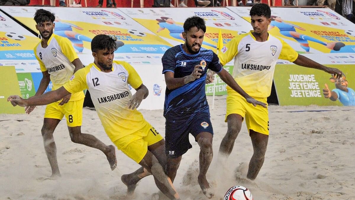 <div class="paragraphs"><p>File photo of players of Goa and Lakshadweep (in yellow) during their beach football match at the 37th National Games, in Goa.&nbsp;</p></div>
