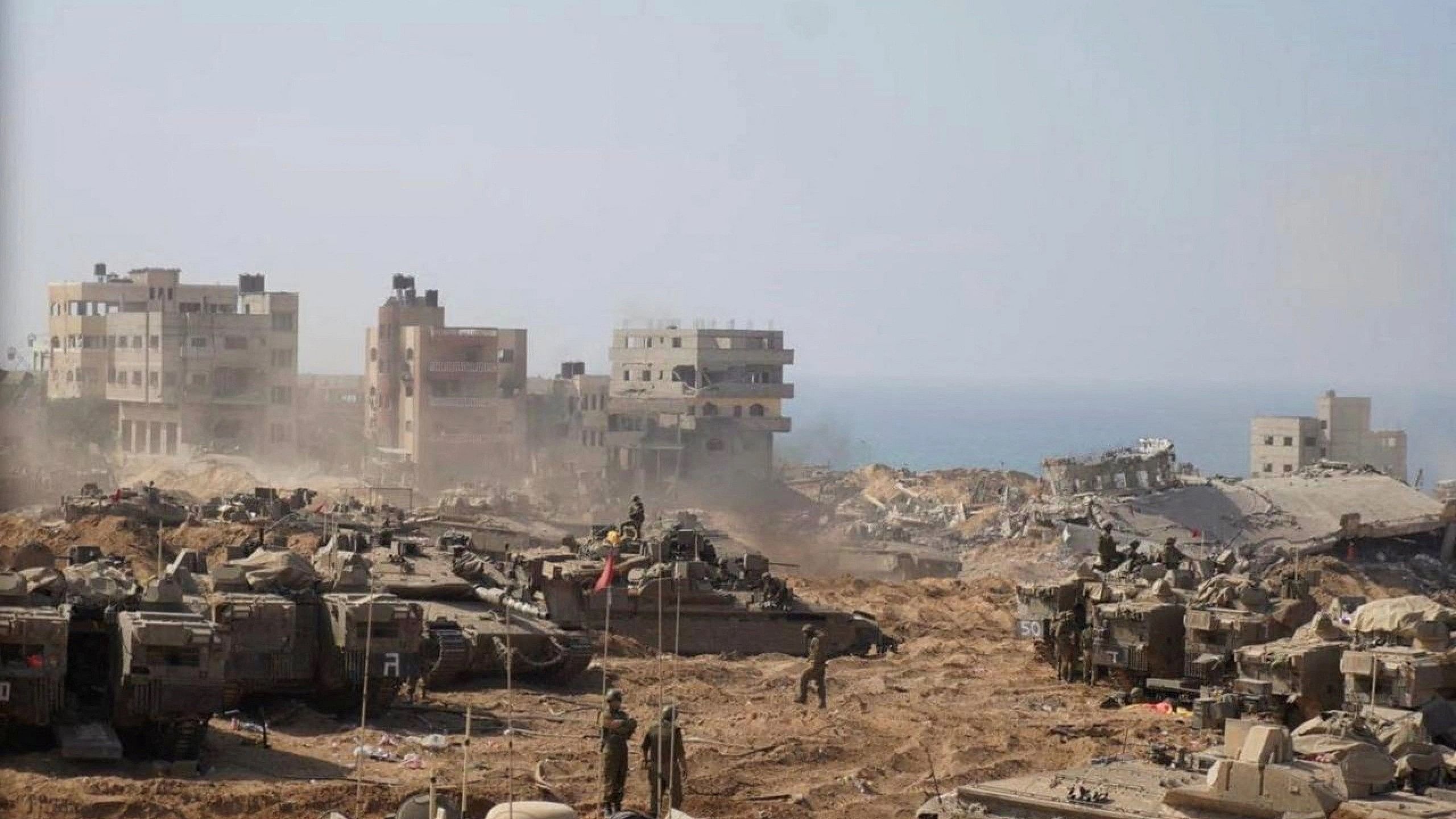 <div class="paragraphs"><p>Israeli soldiers and tanks take position inside the Gaza Strip, according to the Israeli Defense Forces (IDF), in this handout picture obtained by Reuters on November 5, 2023.</p></div>