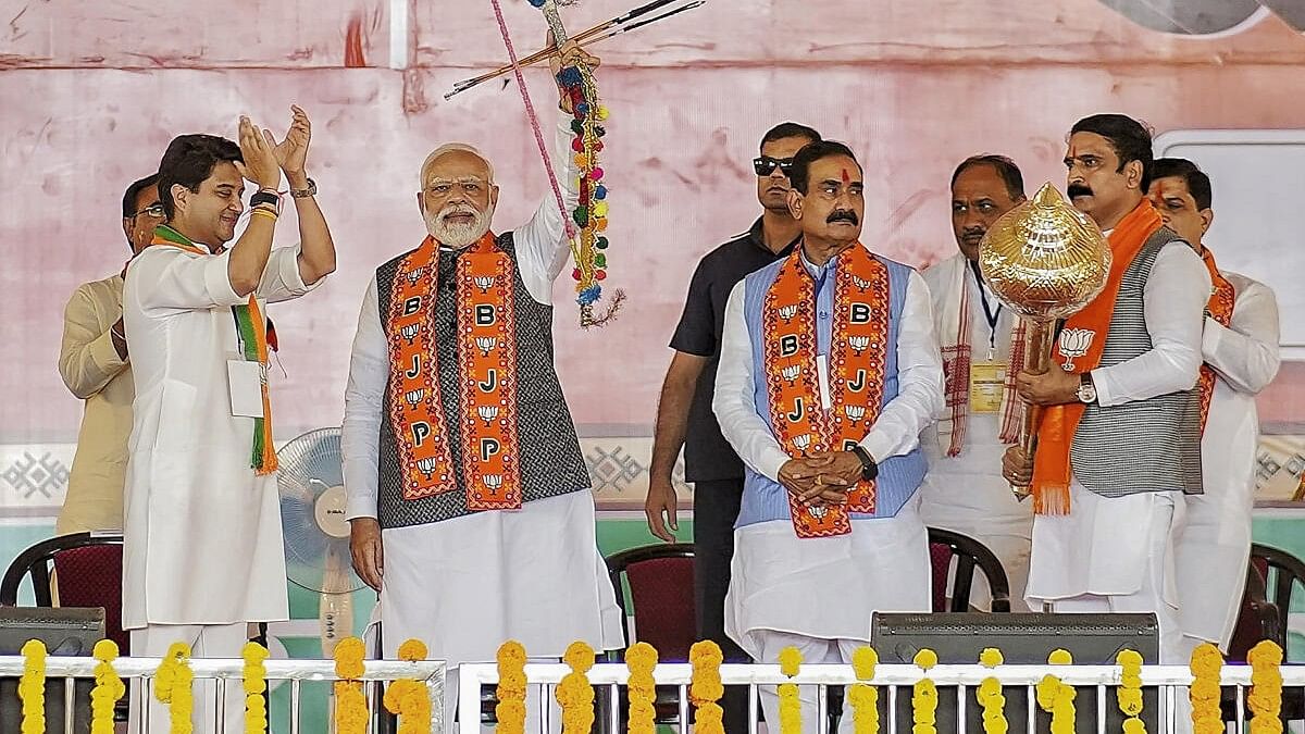 <div class="paragraphs"><p>Prime Minister Narendra Modi during a public meeting ahead of Madhya Pradesh Assembly elections, in Guna district, Wednesday, Nov. 8, 2023. Union Minister Jyotiraditya Scindia is also seen.</p></div>