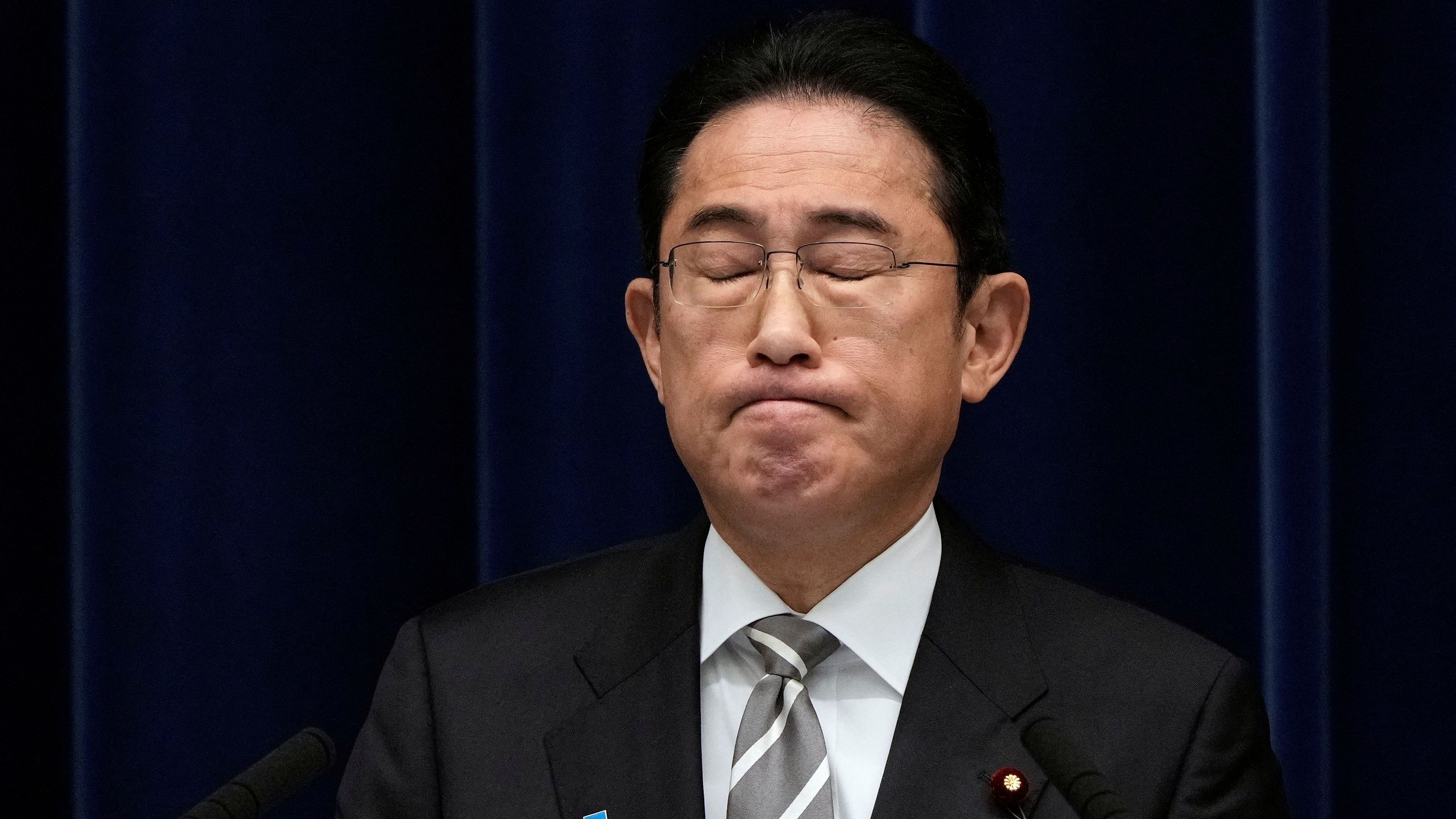 <div class="paragraphs"><p>Japanese Prime Minister Fumio Kishida reacts during a news conference at the prime minister's office in Tokyo, Japan, 13 December 2023.</p></div>