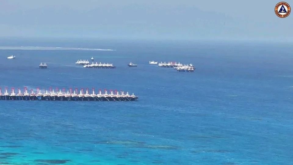 <div class="paragraphs"><p>Chinese militia vessels operate at Whitsun Reef in the South China Sea.</p></div>