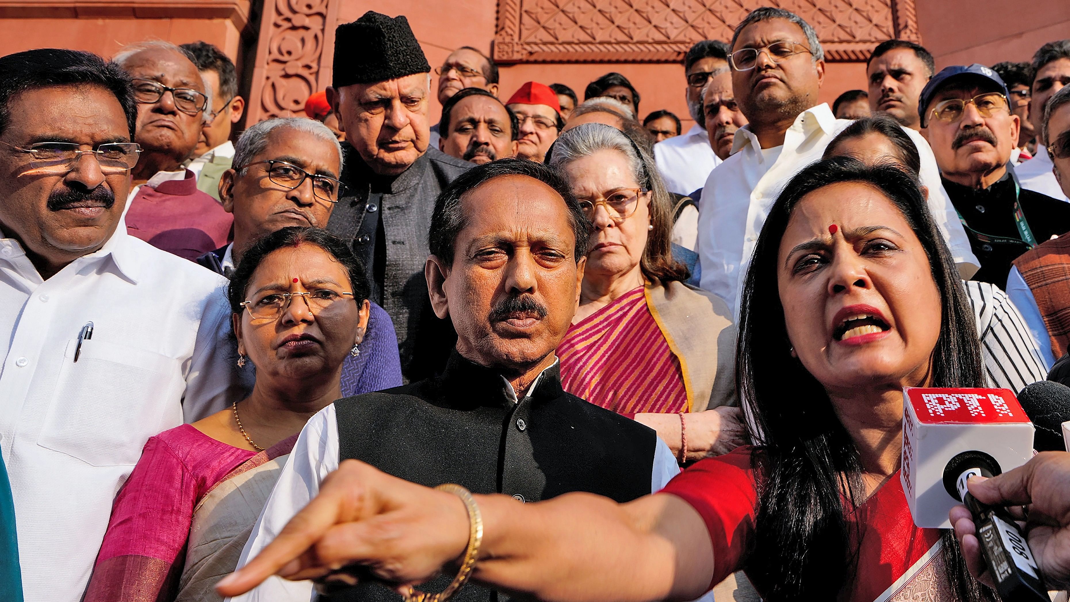 <div class="paragraphs"><p>TMC leader Mahua Moitra addresses the media with Congress MP Sonia Gandhi and other opposition leaders after being expelled by the Lok Sabha during the Winter session of Parliament, in New Delhi, Friday, Dec. 8, 2023. The Lok Sabha on Friday expelled Trinamool Congress MP Mahua Moitra after holding her guilty of sharing her credentials with others and accepting gifts from a businessman to extend favours. </p></div>