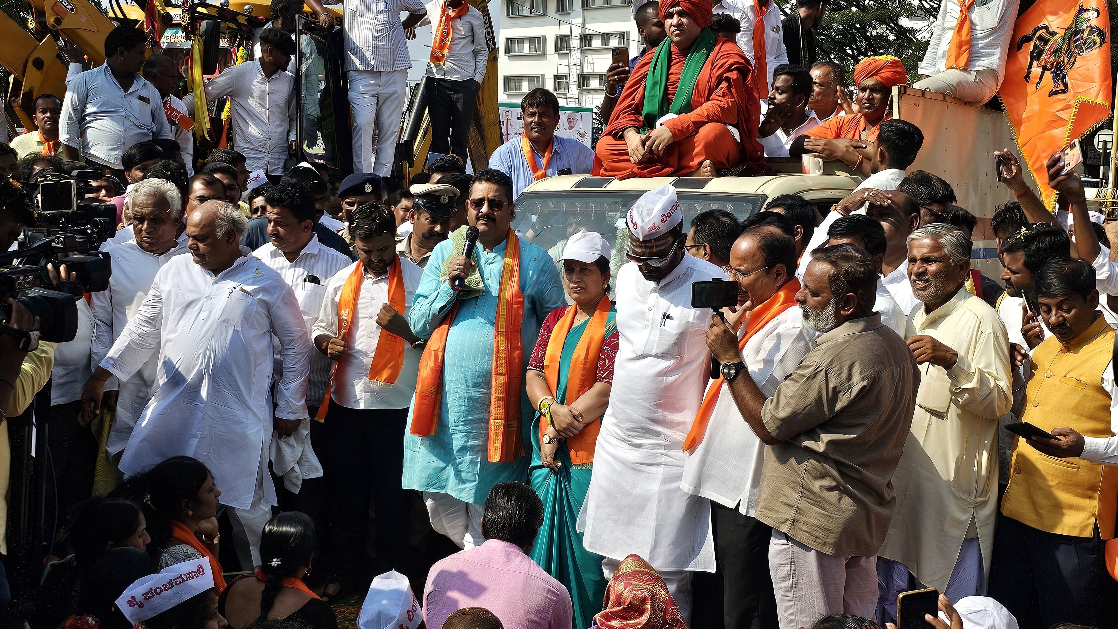 BJP MLA Basanagouda Patil Yatnal speaks at a protest by Panchamasalis, demanding ‘2A’ quota at Rani Chennamma Circle in Belagavi on Wednesday. Minister Shivanand Patil and other community leaders were present.