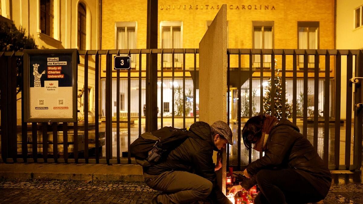 <div class="paragraphs"><p>People light candles in front of the Charles University main building following a shooting at one of the university's buildings in Prague, Czech Republic.</p></div>