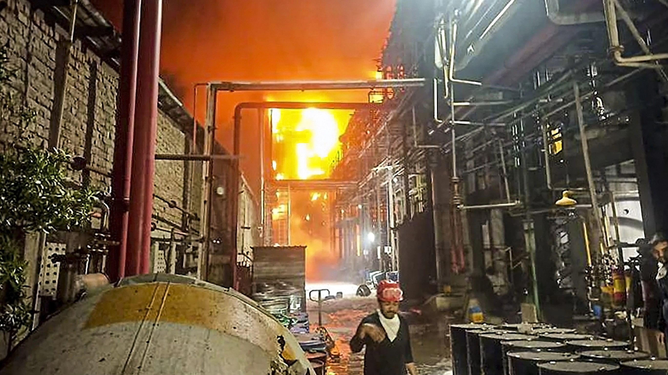 <div class="paragraphs"><p> Flame billows out after a fire broke out at a chemical plant after an explosion in a storage tank, injuring 24 workers, in Gujarat's Surat, Wednesday, Nov. 29, 2023.  </p></div>