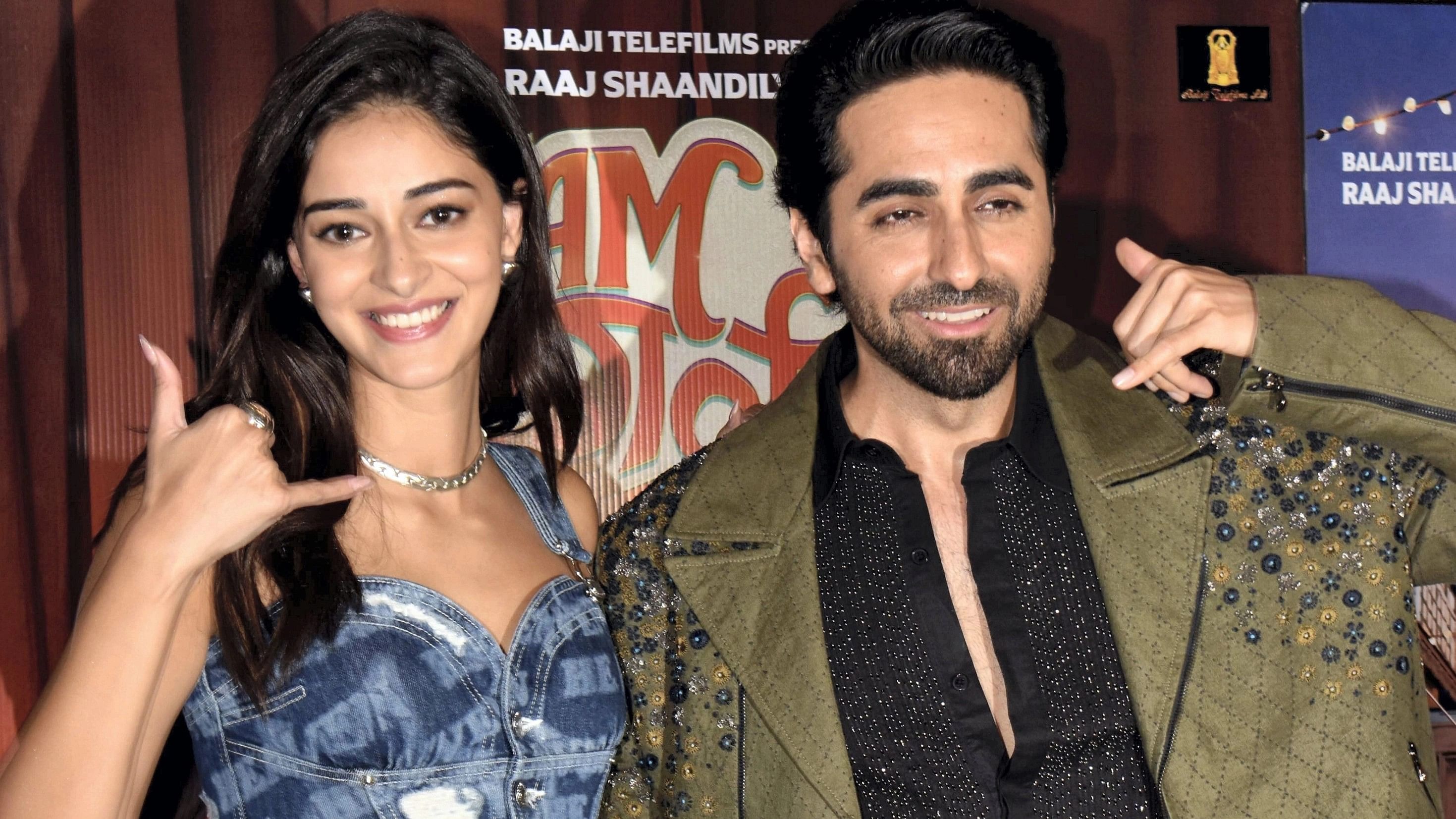 <div class="paragraphs"><p> Actors Ayushmann Khurrana (right) and Ananya Pandey (left) pose for photos at the screening of their film <em>Dream Girl 2</em>.</p></div>