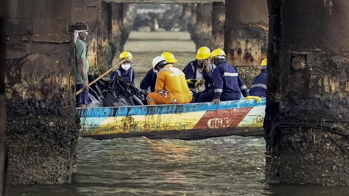 <div class="paragraphs"><p>Rescue officials conduct an operation after an oil spill in the Bay of Bengal off the Ennore Creek area in the aftermath of Cyclone Michaung, in Chennai.</p></div>
