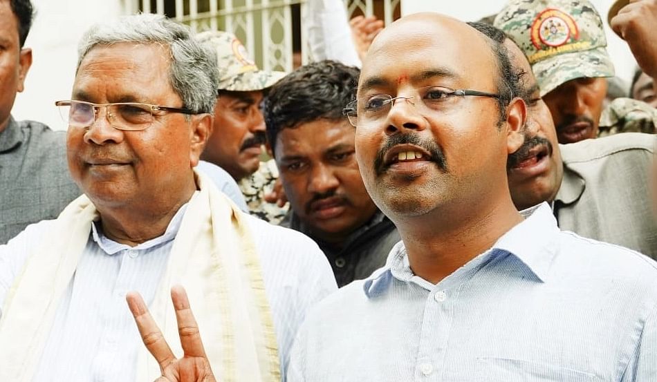 <div class="paragraphs"><p>Karnataka Chief Minister Siddaramaiah and his son Yathindra.</p></div>