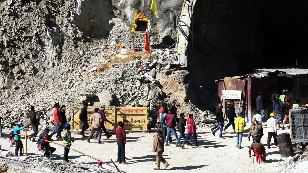<div class="paragraphs"><p>People at the under-construction Silkyara Bend-Barkot Tunnel after the successful evacuation of the 41 trapped workers, in Uttarkashi district.&nbsp;</p></div>