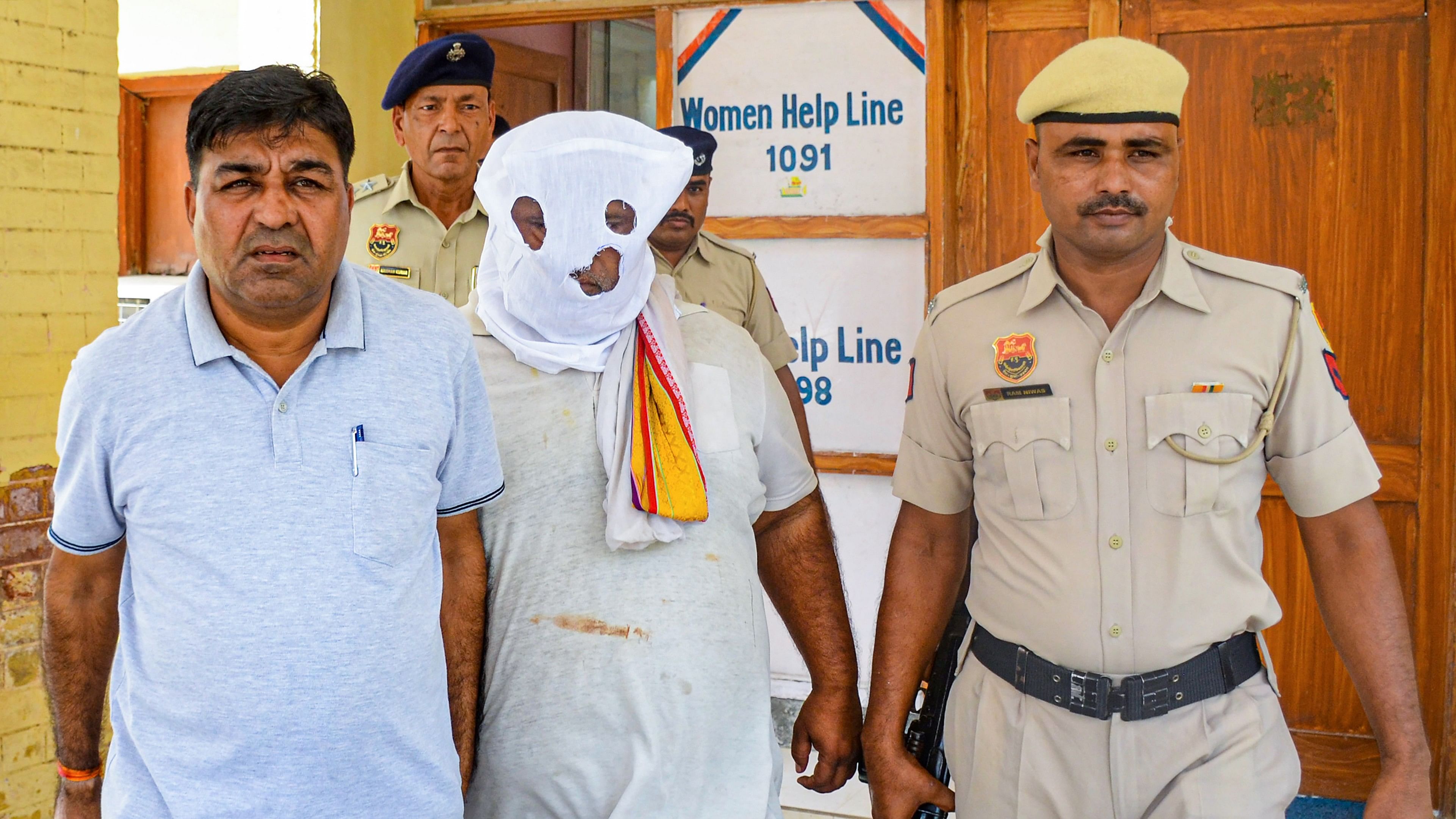 <div class="paragraphs"><p>Bittu Bajrangi, accused in Nuh violence case, being produced at a court following his arrest, in Nuh district, Thursday, Aug. 17, 2023.</p></div>