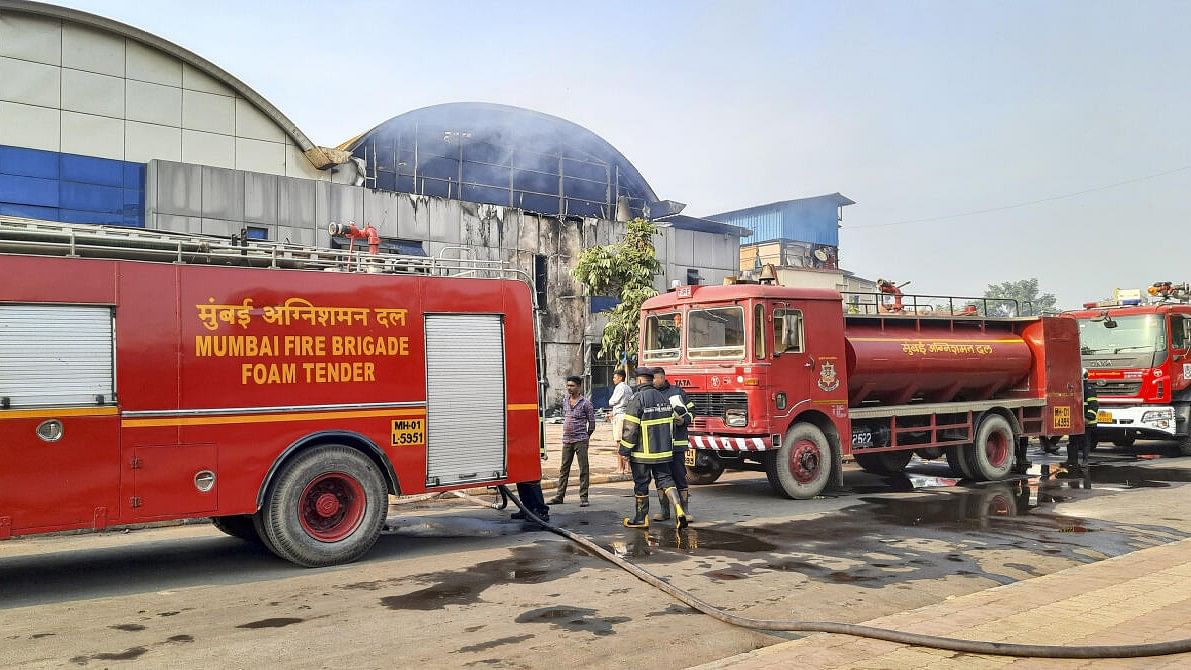 <div class="paragraphs"><p>Firefighters attempt to douse a fire that broke out in a canteen on the premises of Lokmanya Tilak Terminus, in Mumbai.</p></div>