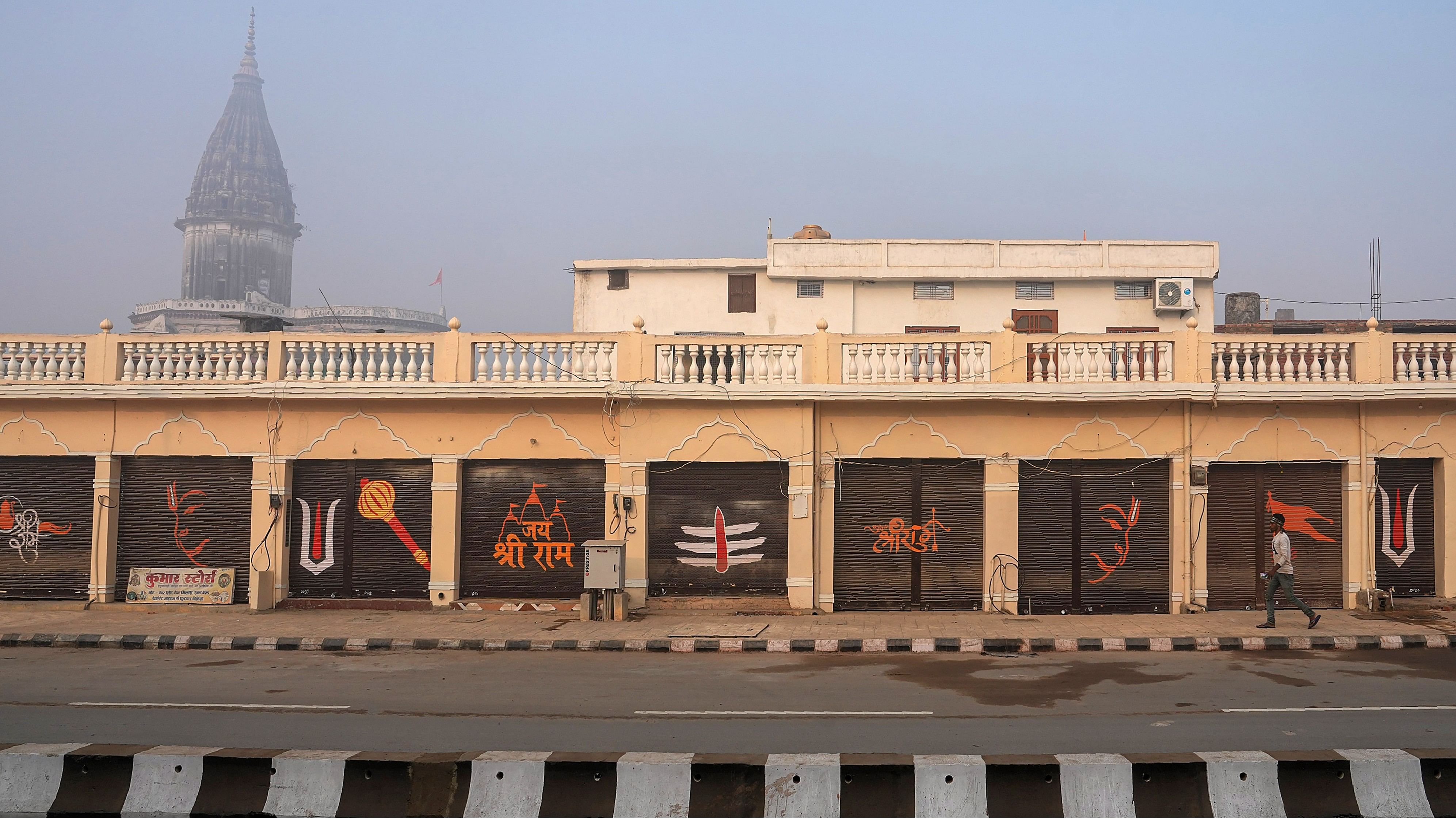 <div class="paragraphs"><p>Shutters of shops along a road decorated with Hindu-theme artwork ahead of the consecration ceremony of the Lord Ram temple, in Ayodhya, Wednesday, December 27, 2023.</p></div>