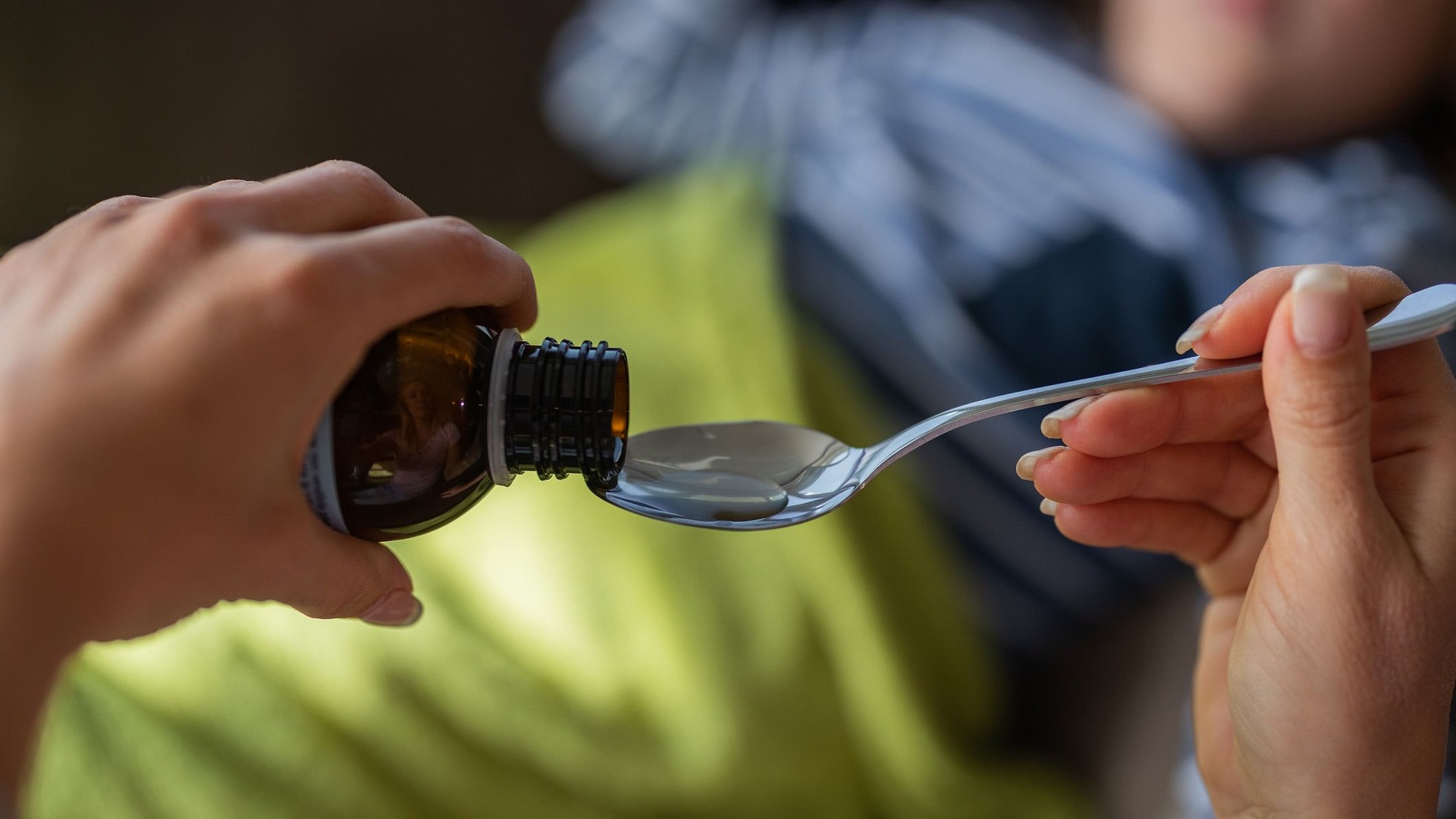 <div class="paragraphs"><p>Representative image of a person pouring cough syrup.</p></div>